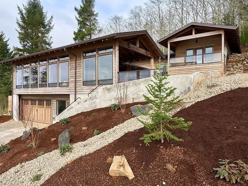 Two story custom home with oversized windows in Oregon